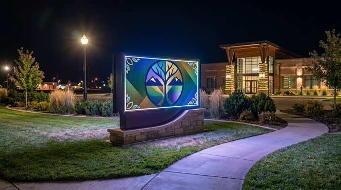 Outdoor LED monument sign glowing at night